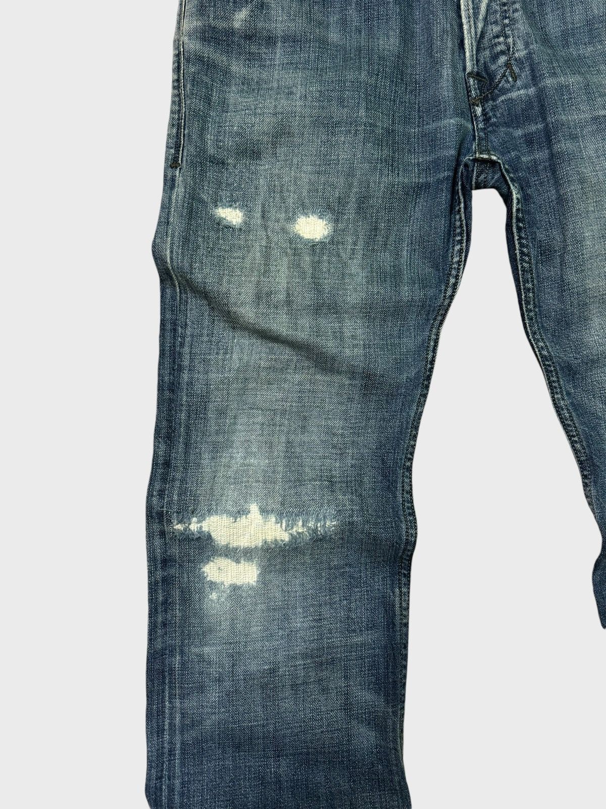 DIESEL INDUSTRY SNAP BUTTON DISTRESSED DENIM JEANS - 7