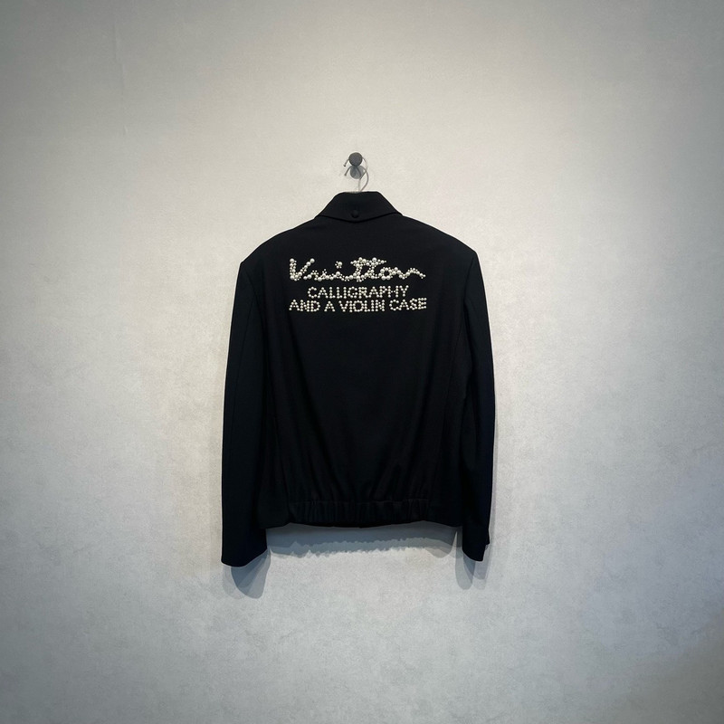 Louis Vuitton blazer with pearl button logo on the back. - 1