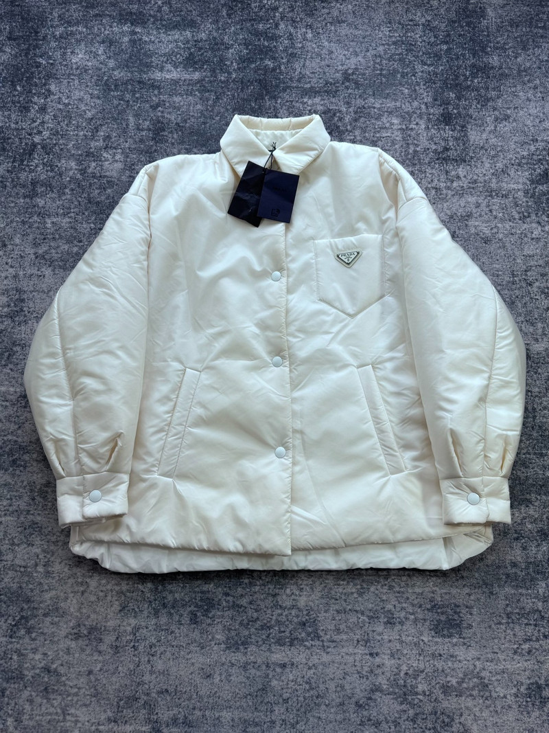 Prada white nylon padded jacket with triangular logo. - 1