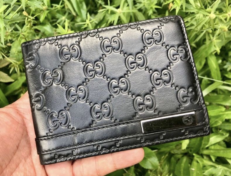 Authentic Gucci Guccisima Leather Black Bifold Wallet - 1