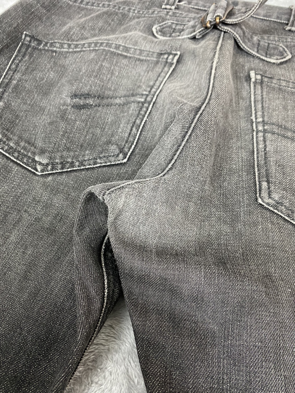 Neil Barrett Buckle Back Denim jeans - 14