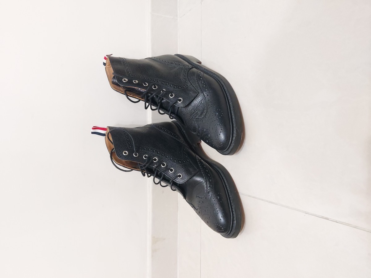 Pebble Grain Leather Wingtip Boots - 1