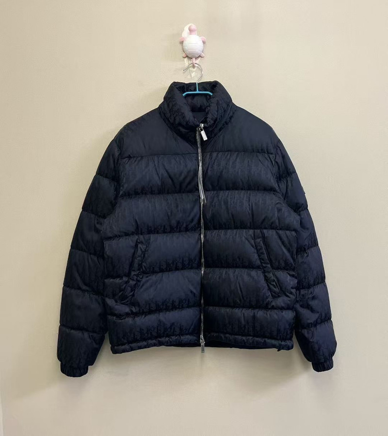 DIOR black down jacket with all-over logo pattern. - 1
