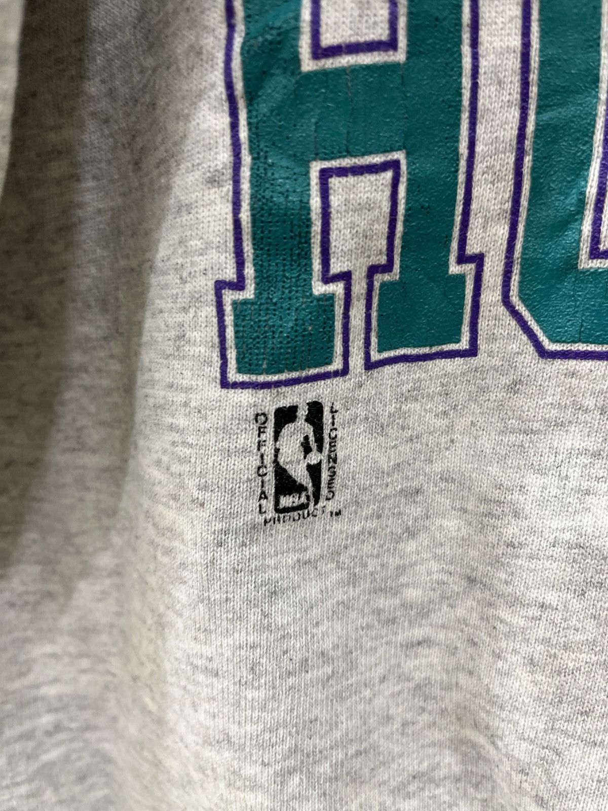 (Eeee).🔥🔥🔥STEALS VINTAGE CHAMPION NBA CHARLOTTE HORNETS - 7