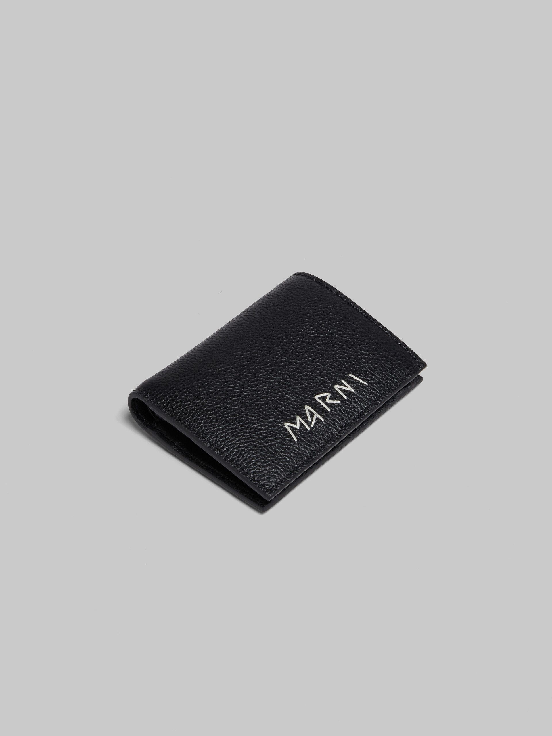 LEATHER BIFOLD WALLET WITH MARNI MENDING - 1