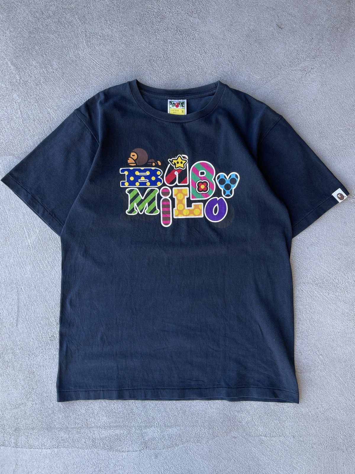 Bape Baby Milo Magical Spell-out Tee (M) - 1