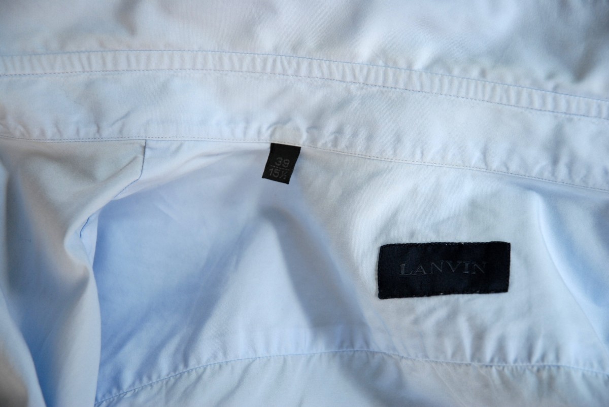 Light Blue Shirt With Alternative Buttoning - 8