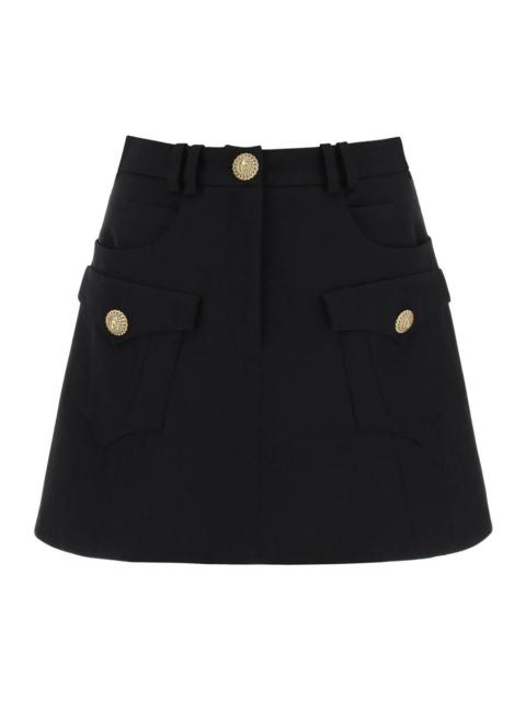 BALMAIN TRAPEZE MINI SKIRT WITH EMBOSSED BUTTONS