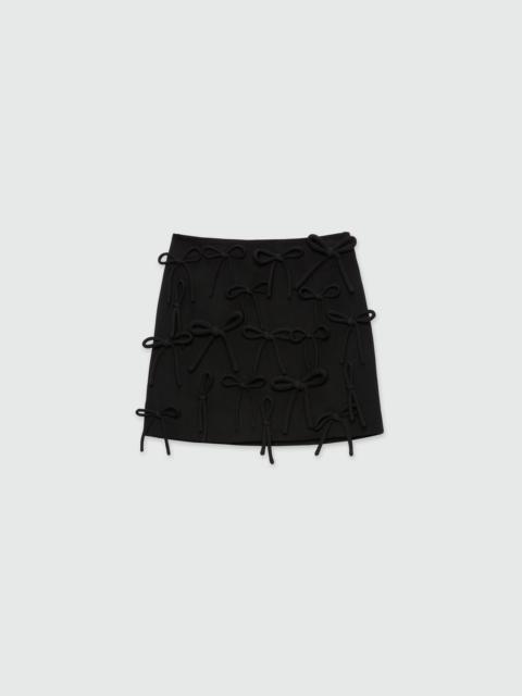 MSGM Black miniskirt in double crepe cady with bow detail