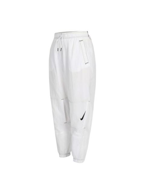 Nike (WMNS) Nike Nsw Rpl Swsh Gx Hr Jggr Woven Casual Loose Bundle Feet Sports Pants/Trousers/Joggers Aut