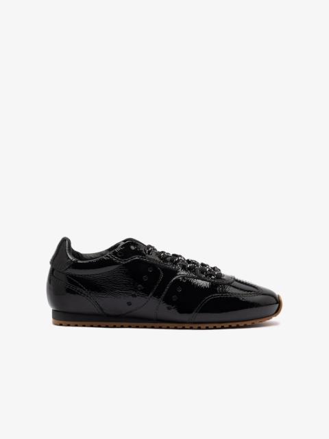 Larroudé Stella Sneaker In Black Patent Leather