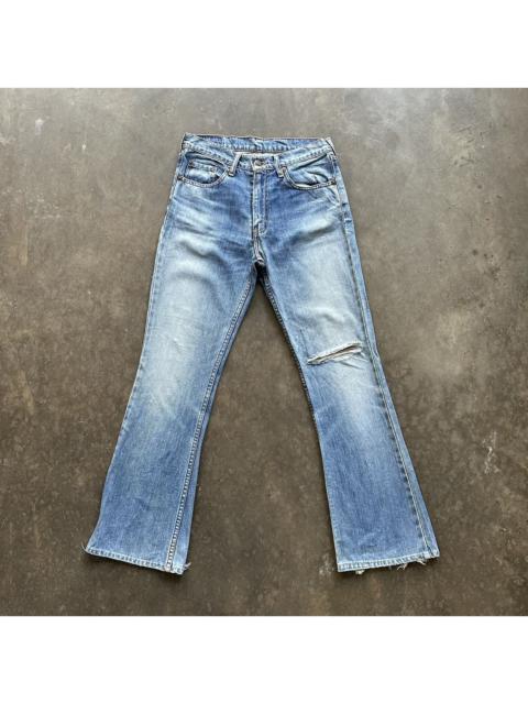 Other Designers Japanese Brand - Vintage Levi’s 557 Distressed Flare Faded Denim Jean Pant