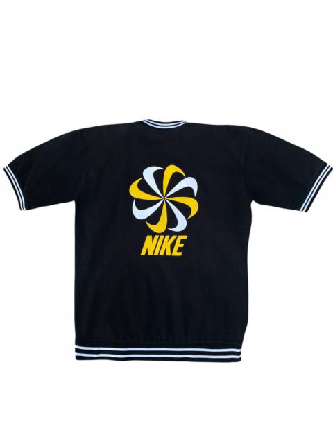 VINTAGE 90’S NIKE PINWHEEL SWOOSH GRAPHIC TEE SHIRT