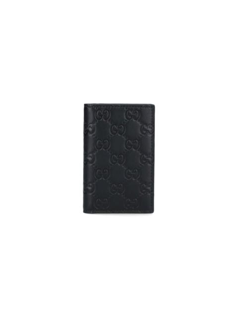 GUCCI 'GG EMBLEM' CARD HOLDER