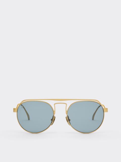 Ferrari Ferrari sunglasses in matte goldtitanium with blue lenses