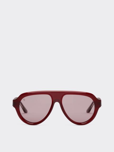 Ferrari Ferrari sunglasses in opal red acetate with gold mirrored purple polarized lenses