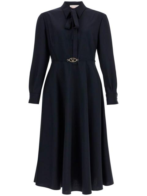 Valentino Garavani elegant navy blue wool dress with long sleeves and golden belt