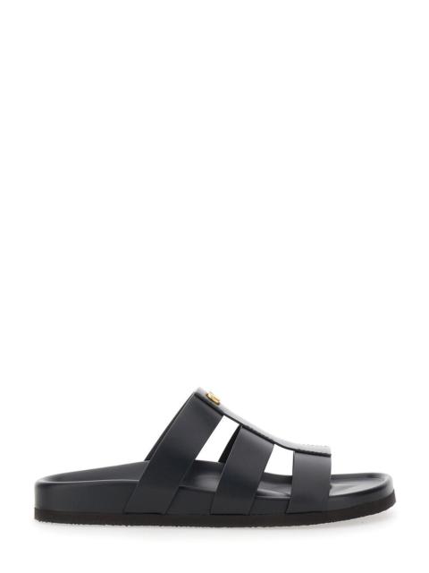 Valentino Valentino Garavani Men Sandals With Cage Design And Vlogo Plaque On The Front In Black Leather Man