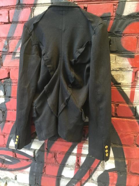 Comme Des Garçons Boiled poly asymmetric jacket.Like Elena Dawson or Julius