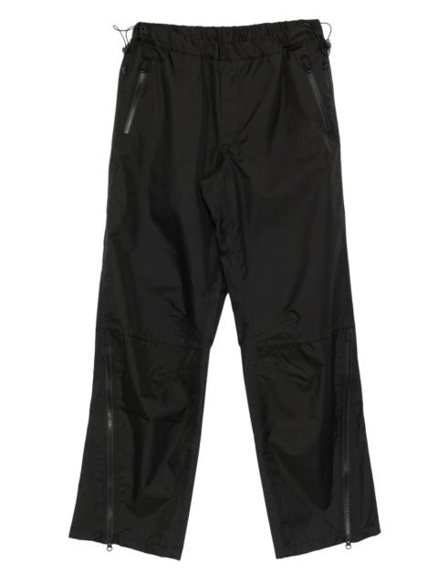 GR10K zip-pocket trousers