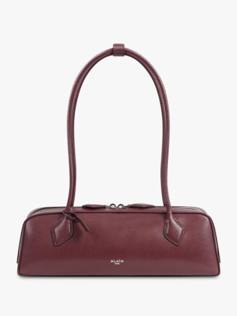 Alaïa LE TECKEL MEDIUM SHOULDER BAG | GARNET RED