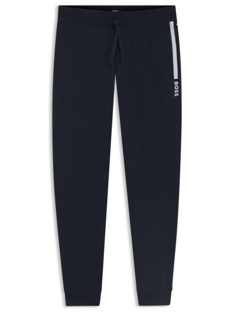 BOSS LOGO-PRINT TRACKSUIT BOTTOMS IN COTTON TERRY