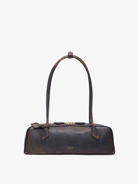 Alaïa Le Teckel Medium ebony black bag