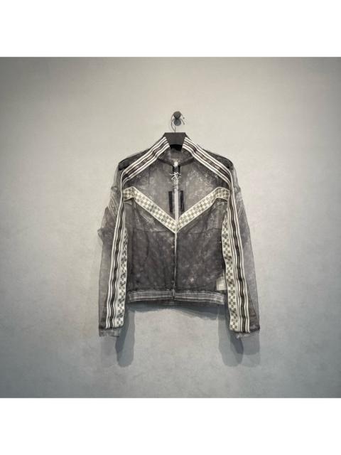 Louis Vuitton Louis Vuitton runway collection organza jacket with all-over logo print.