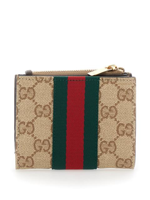 GUCCI Gucci Women Beige Wallet With Web Stripe And Zip Closure And Magnetic Button In Gg Canvas For Women