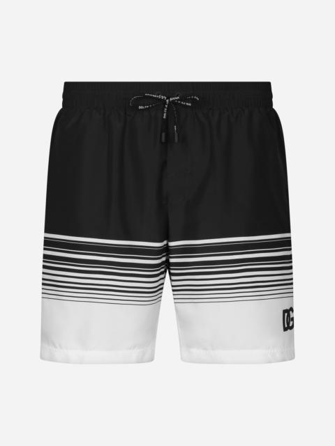 Mid-rise swim trunks with DG print