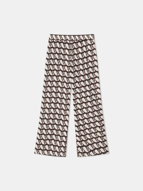 AERON MALIK
Monogram print silk pants