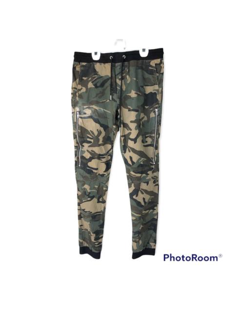 Other Designers Forever 21 - Distressed Denim Camouflage Pants
