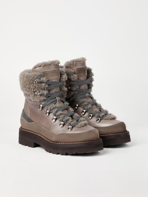 Brunello Cucinelli Classic leather mountain boots with fuzzy shearling lining and precious contour