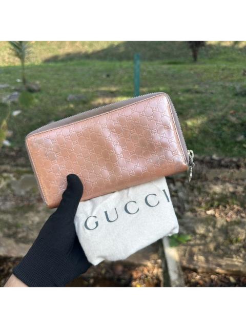 GUCCI Gucci Microguccissima Zip Around Long Wallet – Heart Charm
