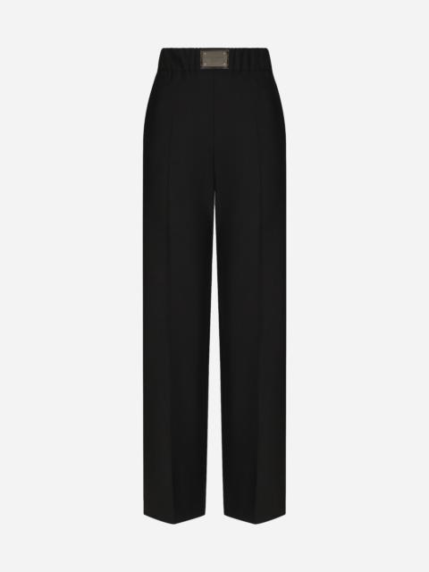 Dolce & Gabbana Flared wool pants with logo tag