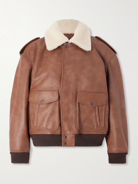SAINT LAURENT Shearling-trimmed leather jacket Brown