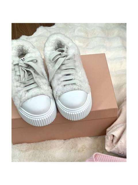 Womens Faux Fur Platform Sneakers With Lace-Up Closure & Rubber Sole