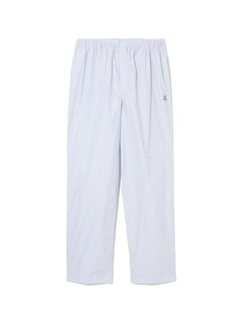 UNDERCOVER STRIPED ELASTICATED TROUSERS