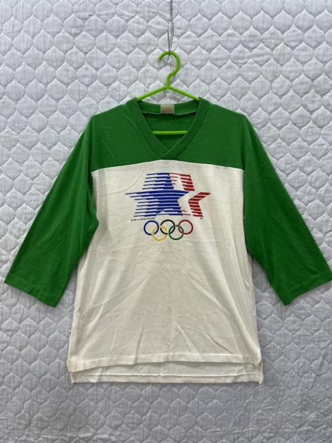 E. VINTAGE LEVIS OLYMPIC LA 3QUARTER TSHIRT