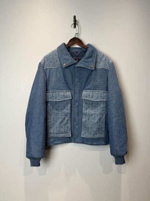Louis Vuitton LOUIS VUITTON denim jacket with logo print and pocket detail.