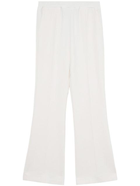 JW Anderson tech-jersey flared trousers
