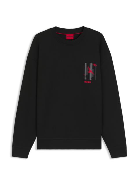 HUGO COTTON-TERRY SWEATSHIRT WITH BIRD ARTWORK