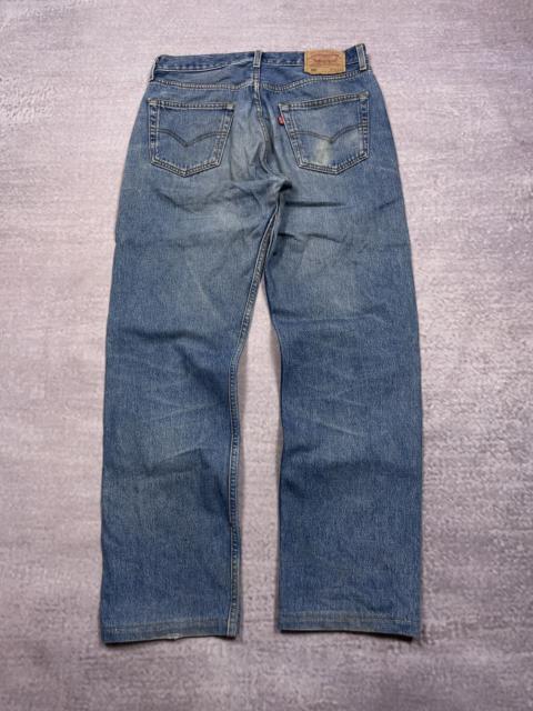 Vintage Levi's 501 Blue Distressed Mud Wash Denim Jeans
