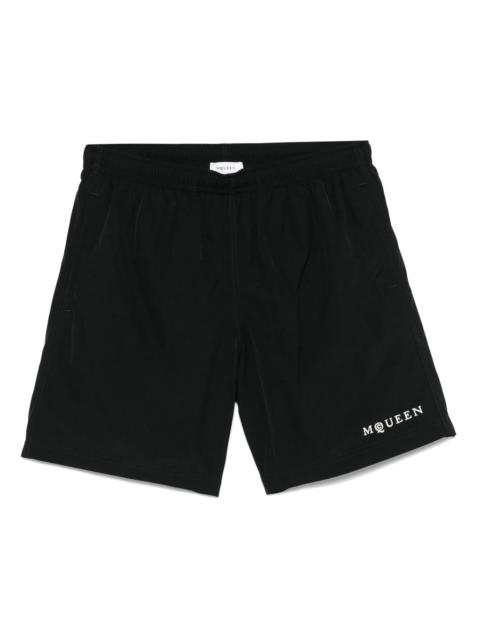 Alexander McQueen logo-embroidered swim shorts