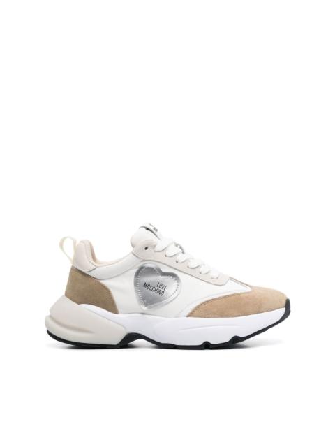 Moschino logo-patch panelled sneakers