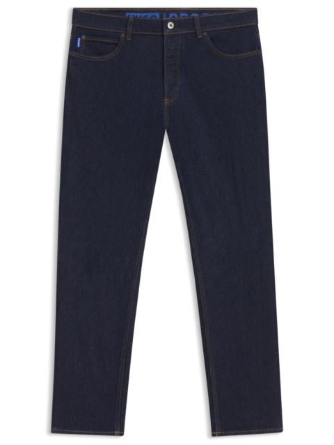 HUGO TAPERED-FIT JEANS IN DARK-BLUE STRETCH DENIM