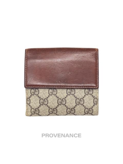 GUCCI Gucci Trifold Snap Wallet - GG Supreme Brown