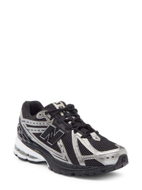 New Balance New Balance Gender Inclusive 1906R Running Shoe in Black/Dark Silver Metallic at Nordstrom