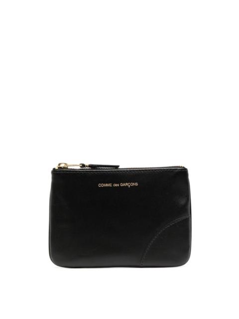 Comme Des Garçons Leather wallet with zip