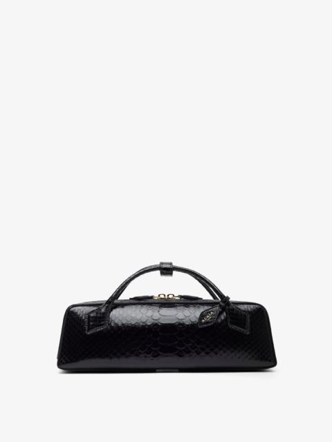 Alaïa Le Teckel black shiny python clutch